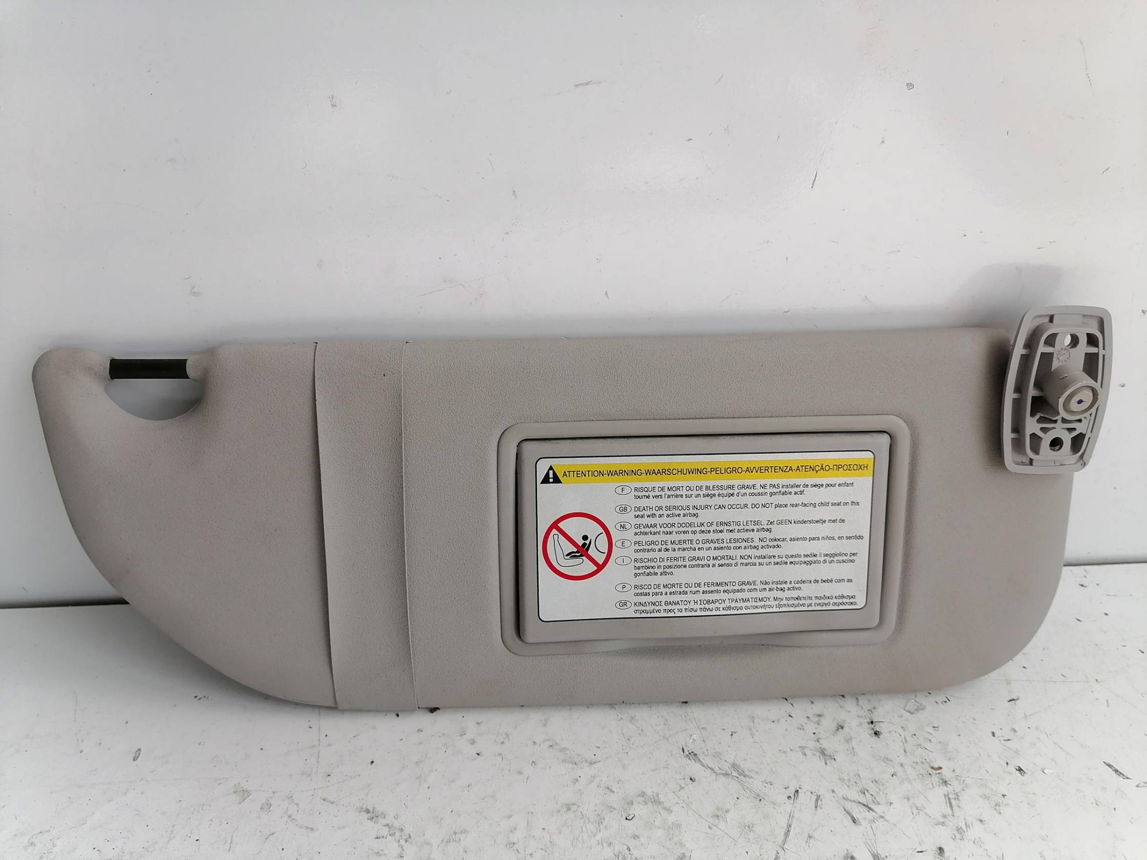 Aletta parasole parabrezza dx.